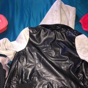 Leather jacket with sweatshirt sleeves